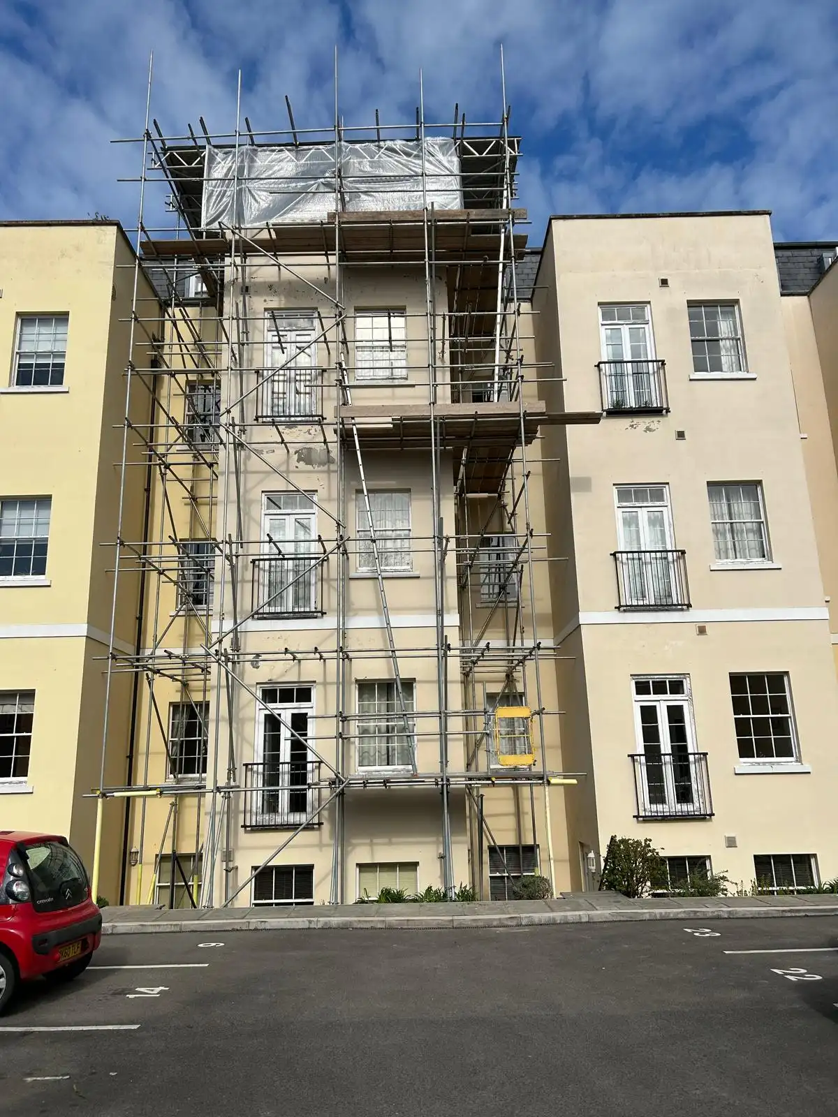 Scaffolding around a multi-storey apartment building